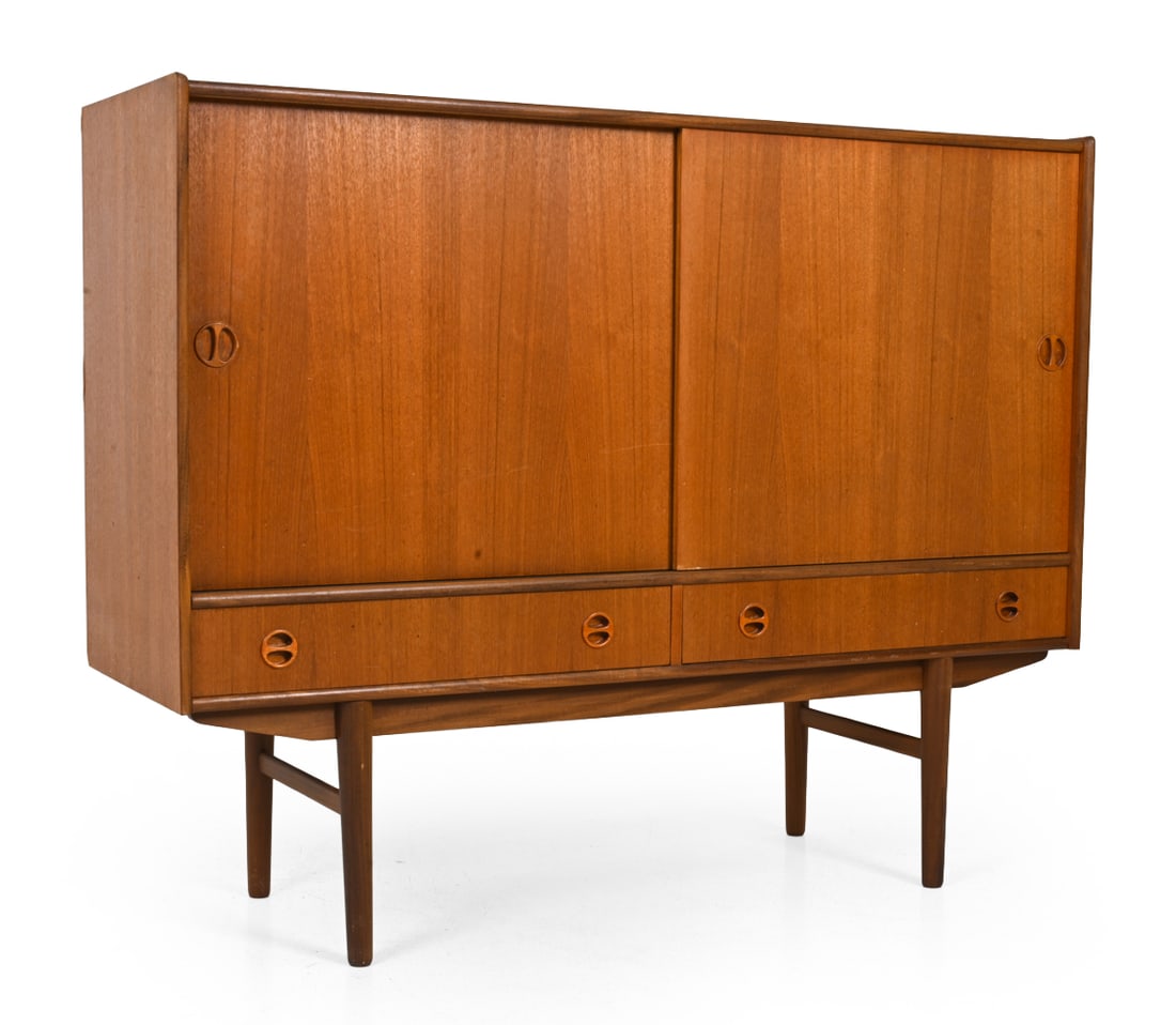 VODSKOV MOBELFABRIK DANISH TEAK SIDEBOARD C. 1960S: Teak sideboard with lower drawers and tapered legs. Apparently unmarked. Denmark, circa 1960s. Dimensions: H 44" x W 55.5" x D 17.75" Condition: Sun fading, discoloration, minor scratches and scuffs.