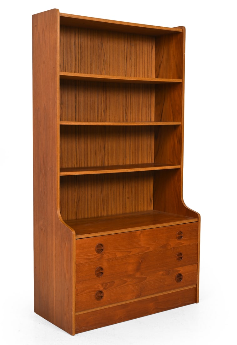 MID-CENTURY DANISH TEAK BOOKCASE C. 1960S: Teak bookcase with open shelving and lower drawers with recessed pulls. Circa, 1960s. Dimensions: H 65" x W 35? x D 16.5? Condition: With few small chips to bottom, rear corners. Backing slightly