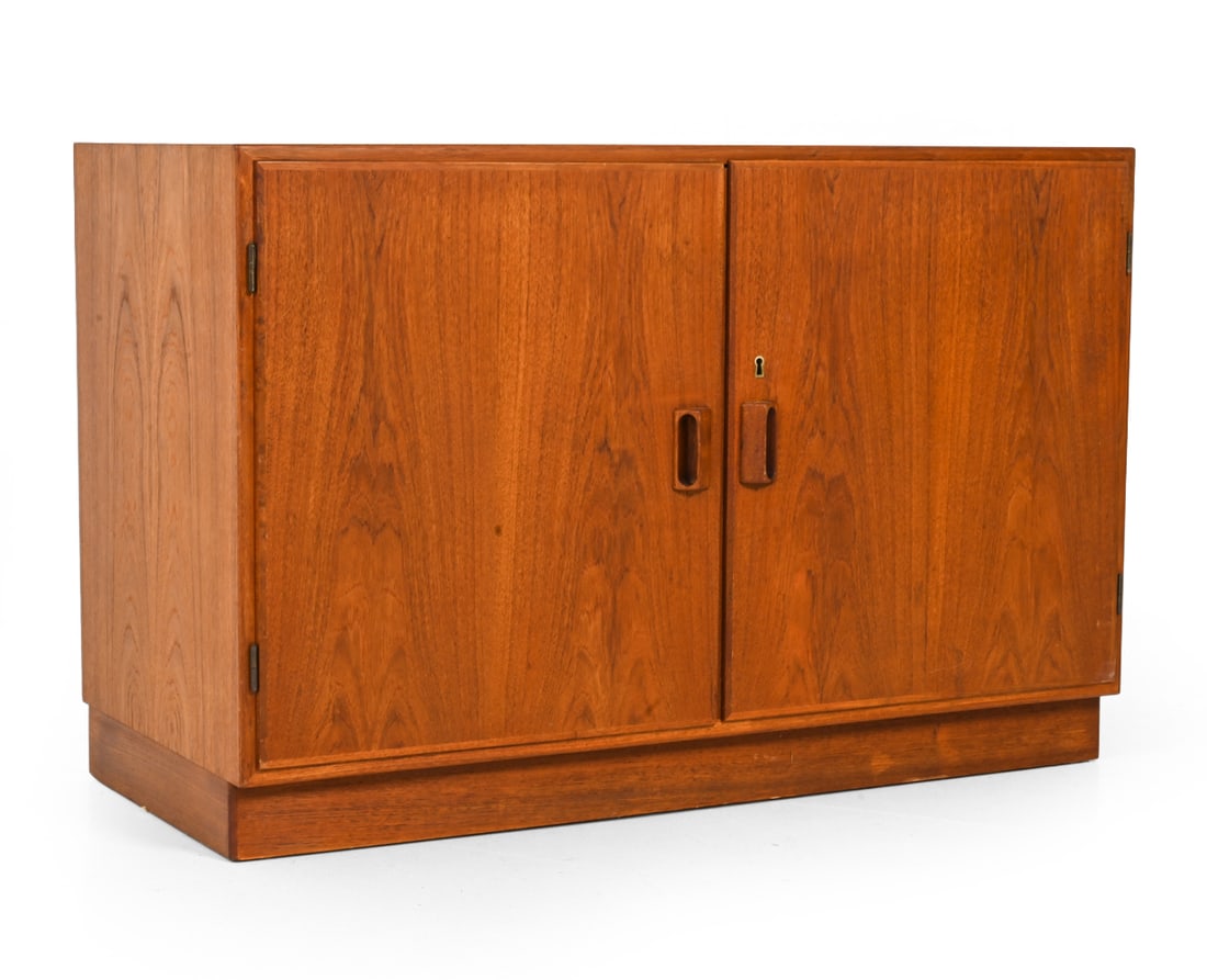 BORGE MOGENSEN FOR SOBORG DANISH TEAK CABINET: Key included. Low cabinet with two door front, vertical pulls and interior shelving. Apparently unmarked. Denmark, circa 1960s. Dimensions: H 26" x W 29.5" x D 18.5" Condition: Scuffs and wear to top