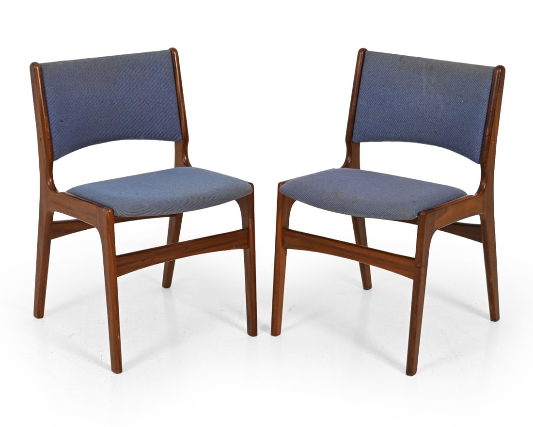 PAIR ERIK BUCH MODEL 89 DANISH TEAK DINING CHAIRS: Pair of teak dining chairs with sculpted frames, blue upholstered seats and back. Denmark, Circa, 1960s. Dimensions: H 31'' x W 19'' x D 20", S.H. 18" Condition: Discoloration and fading to upholstery