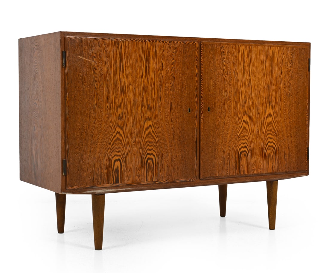 DANISH ROSEWOOD CABINET C. 1960S: Danish furniture mark to interior. Includes key. Dimensions: H 29.75" x W 42.75" x D 17.25" Condition: Fading/discoloration. Scuffs and scrapes. Missing back panel to one side. Wear consistent with ag