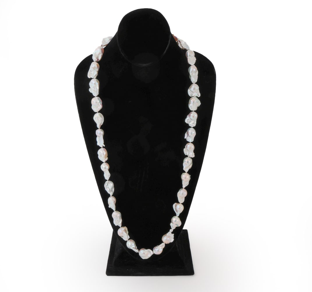 BAROQUE SOUTH SEA PEARL NECKLACE: South sea iridescent pearl necklace including pearls up to 25mm. Apparently unmarked. Dimensions: L 15.5" Condition: Natural imperfections and wear consistent with age.