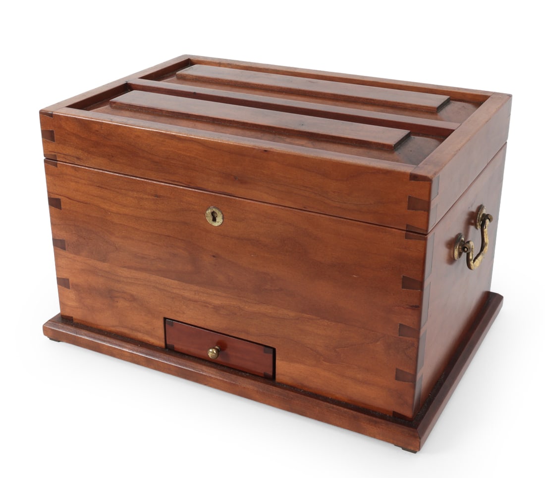 CIGAR HUMIDOR WITH EXPOSED DOVETAIL JOINERY: Brass hardware and compartments to interior. Exposed dovetail corners. Likely cherry wood. Unknown maker. Contemporary, 20th century. Dimensions: H 10.5" x W 17" x D 11.75" Condition: Humidor