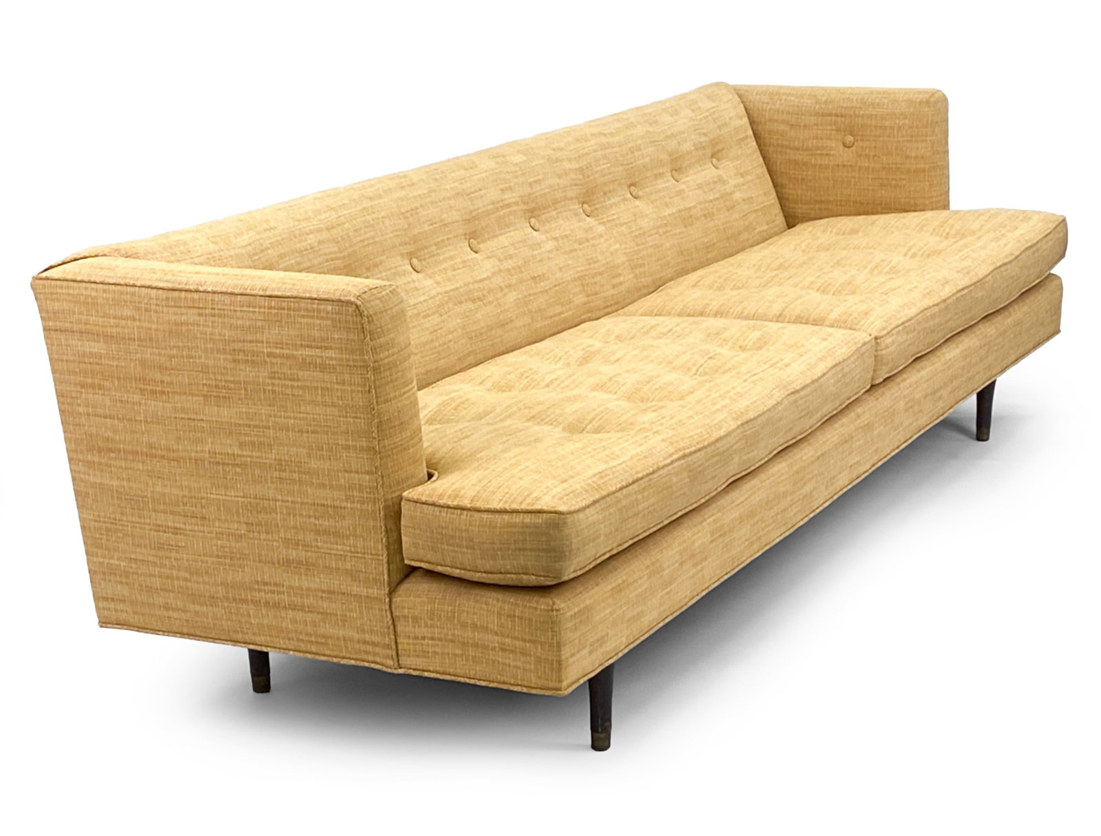 EDWARD WORMLEY FOR DUNBAR SOFA: classic and elegant Mid-Century sofa attributed to Edward Wormley for Dunbar. Features tufted back & long tufted seat on tapered walnut legs. Dimensions: H 28" x W 96" x D 32.5" x SH 17" Condition: