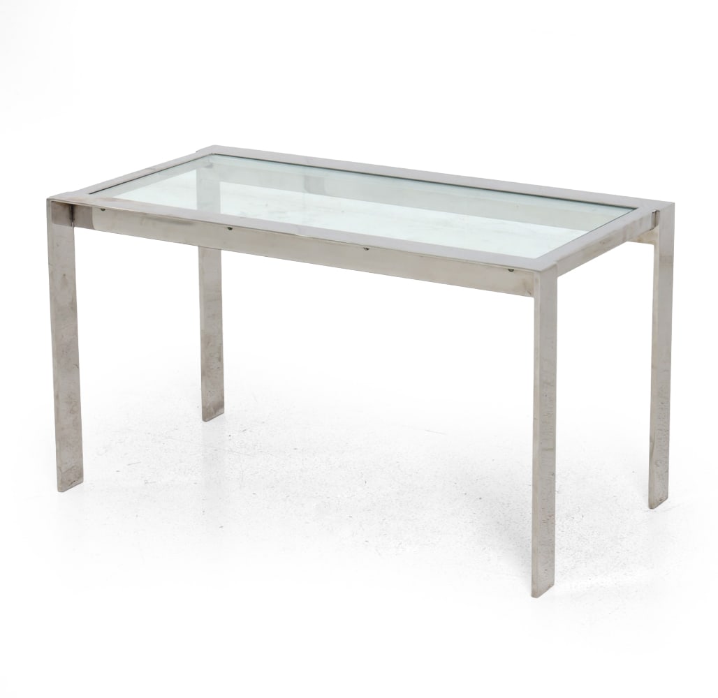MILO BAUGHMAN STYLE GLASS SIDE TABLE: Brushed stainless steel frame with glass top. Dimensions: H 17" x W 30" x D 16" Condition: Surface scratches, scuffs. Wear consistent with age and use.