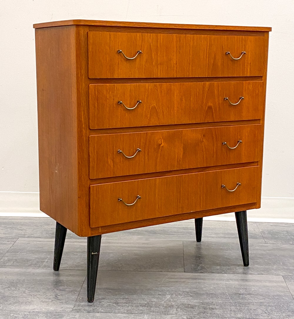 SCANDINAVIAN TEAK CHEST OF DRAWERS C. 1960S: Four-drawer chest with brass pulls. Scandinavian, circa 1960s. Dimensions: H 30.5" x W 26" x D 13" Condition: Scuffs, fading. Wear consistent with age and use. Minor veneer loss to bottom.