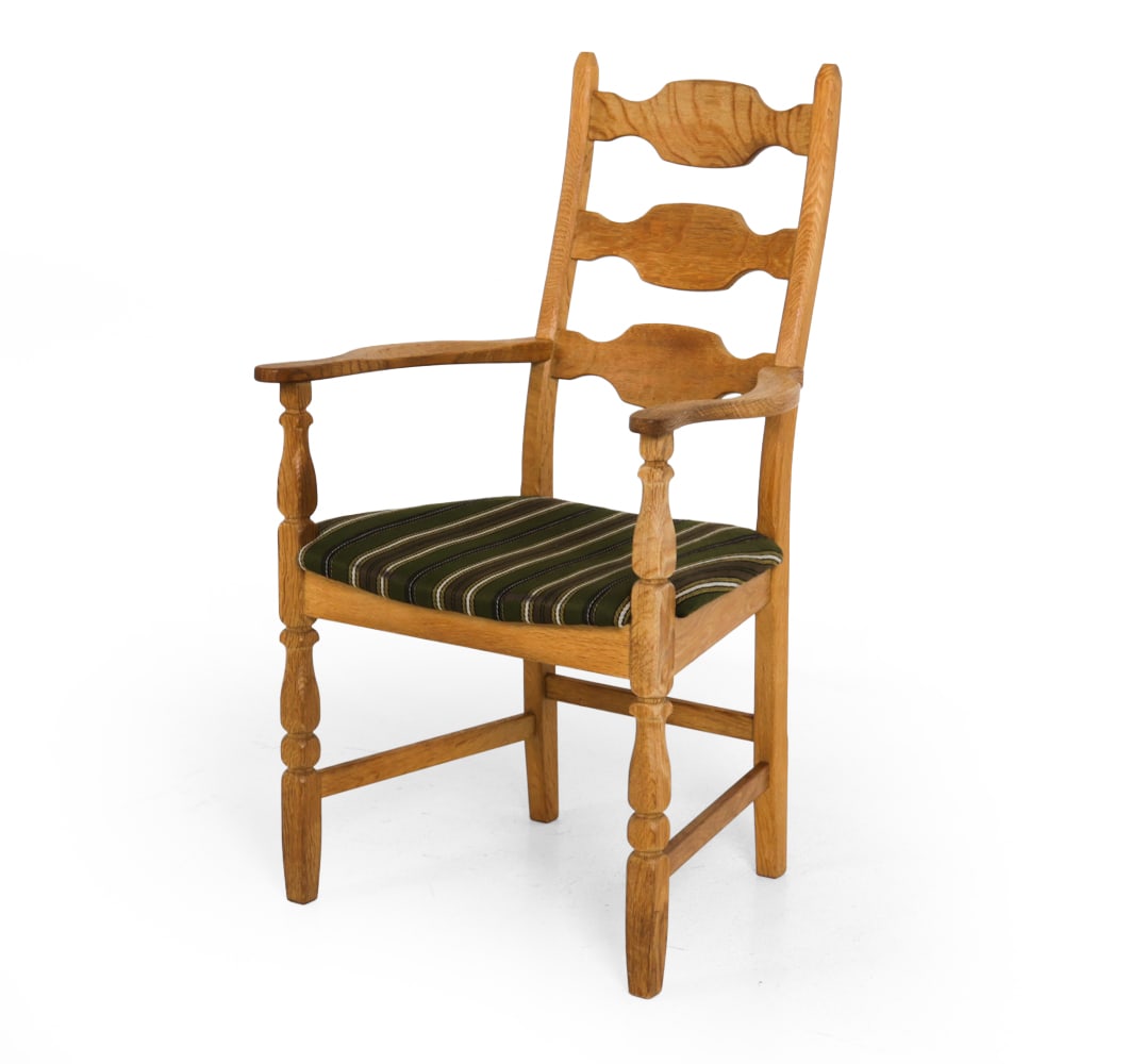 HENNING KJAERNULF DANISH OAK ARMCHAIR 1960S: Oak frame with slatted back detail and striped upholstery. Apparently unmarked. Denmark, circa 1960s Dimensions: H 39.5 " x W 22.5 " x D 20 ", SH 17 " Condition: Surface wear consistent with age and u