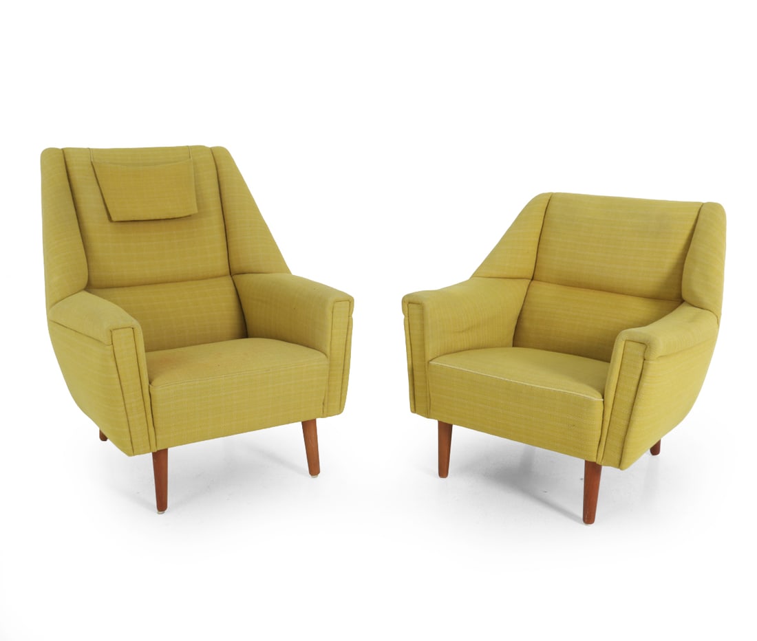 (2) KURT OSTERVIG DANISH LOUNGE CHAIRS C. 1970S: His and hers. Yellow green upholstery with teak legs. Apparently unmarked. Denmark, circa 1970s. Dimensions: (His) H 32.5" x W 26" x D 24.5" x SH 15" (Hers) H 37.5" x W 32" x D 24" x SH 16" Condition: