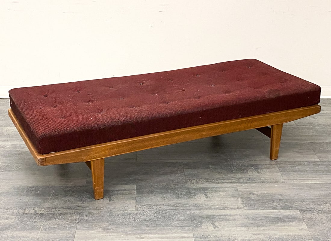 ATTR. POUL VOLTHER DANISH TEAK DAYBED: Dimensions: H 18" x W 74" x D 31" Condition: Wear consistent with age and use. Soiling marks, fading, scuffs to cushion. Scuffs, rubs, fading to frame. Hole to underlining.