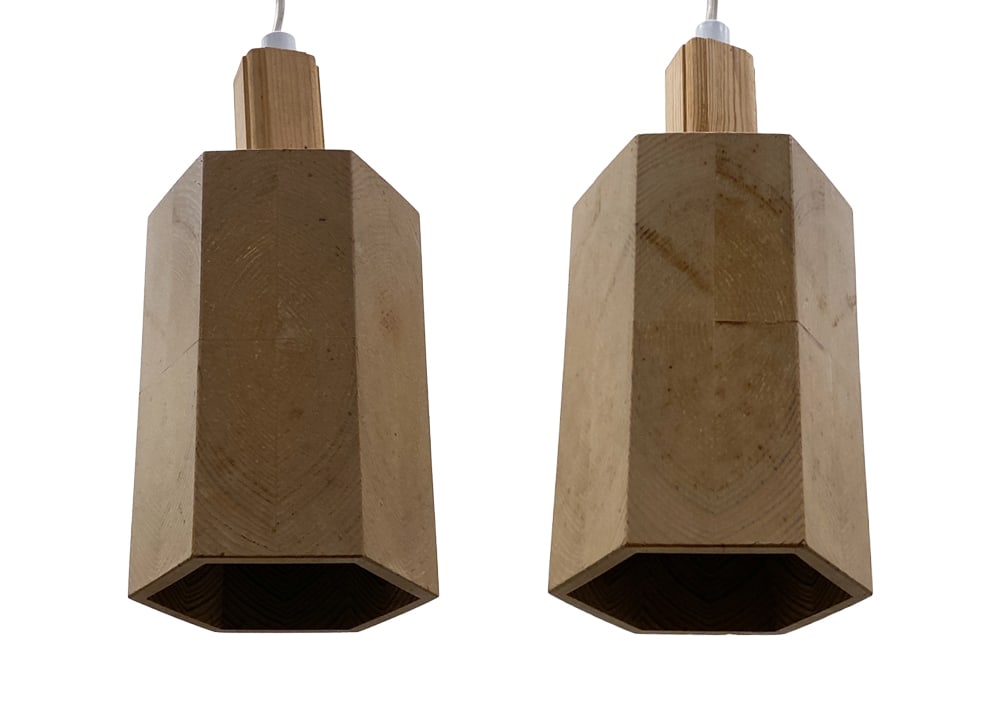 PAIR STYLE OF WIKNER SWEDISH PINE PENDANT LIGHTS: (2) Pendant lights. Apparently unmarked. Sweden, circa 1960s. Dimensions: H 11" x Dia 5" Condition: Wear consistent with age and use. Untested. Some scuffs. No canopy but cable with European plug.