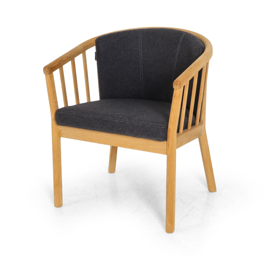 SKALMA "SONET" DANISH OAK ARMCHAIR: Oak frame with grey upholstery. Marked to the lining of the back cushion. Denmark, 21st century. Dimensions: H 30" x W 25" x D 19" x SH 18.5" Condition: Minor scuffs and scratches to frame. Wear consi