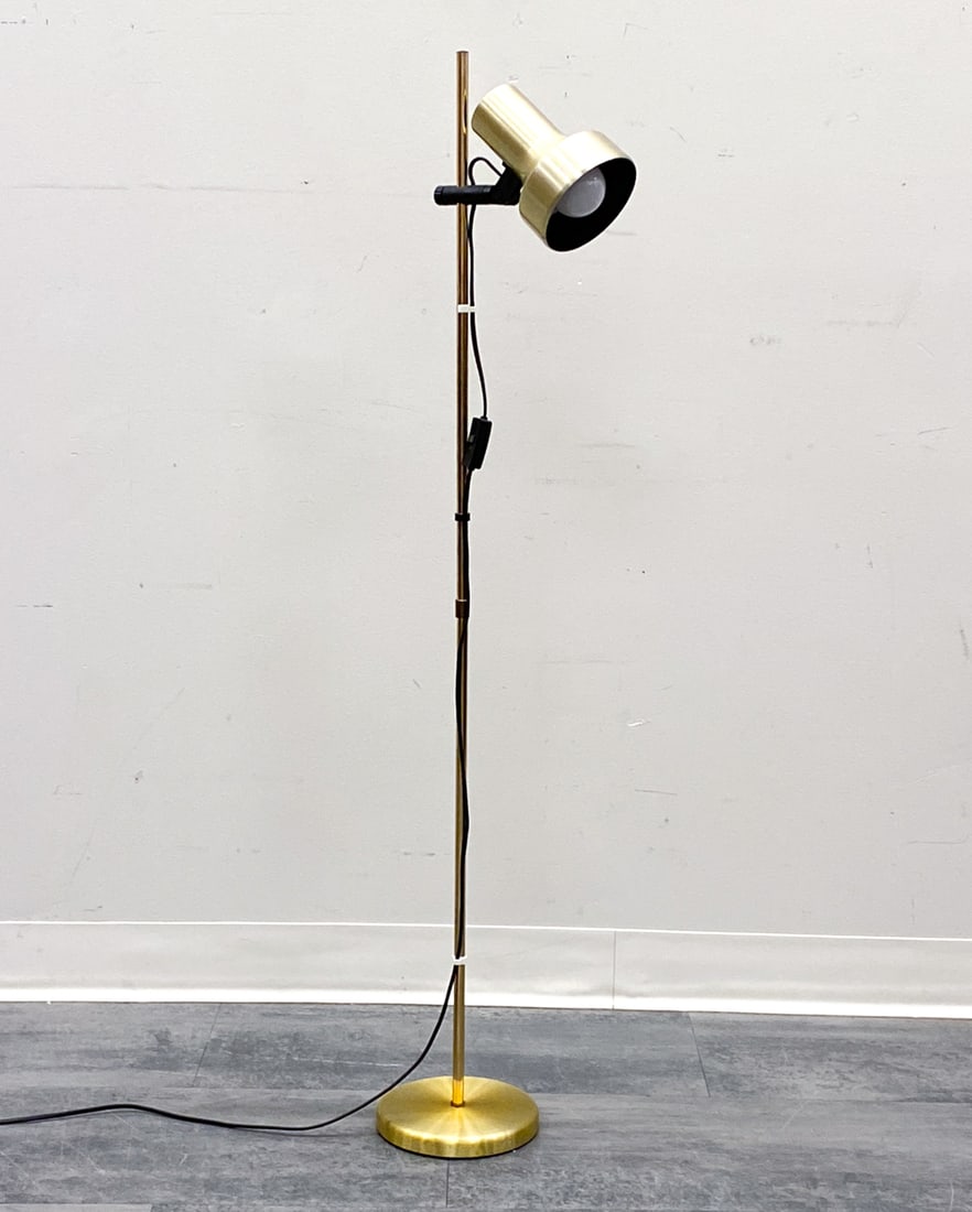 AB BELID DANISH BRASS ADJUSTABLE FLOOR LAMP 1970S: Marked underneath. Brass tone aluminum shade. Denmark, circa 1970s. Dimensions: H 47.5" x W 12" x D 7.25" Condition: Wear consistent with age and use. Untested. European plug. Couple of scuffs.