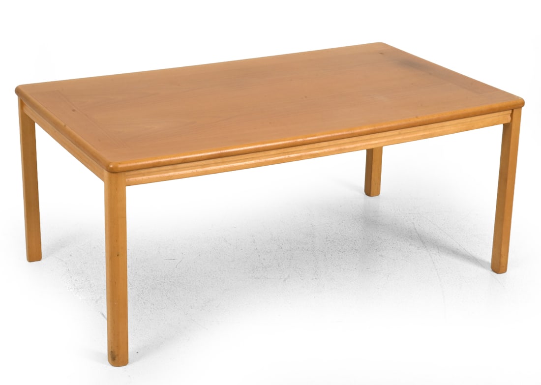 NIELS BACH STYLE DANISH BEECH COFFEE TABLE 1960S: Denmark, circa 1960s. Dimensions: H 21.5" x W 50" x D 29" Condition: Some minor scuffs. Discoloration. Wear consistent with age and use. 5078