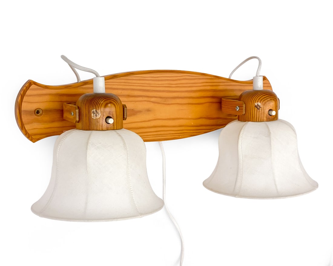 MARKSLOJD SWEDISH PINE WALL SCONCE 1966: Marked to underside. Sweden, circa 1966. Dimensions: H 8.5" x W 19.5" x D 7.5" Condition: Wear consistent with age and use. Untested European plug. Some scuffs.