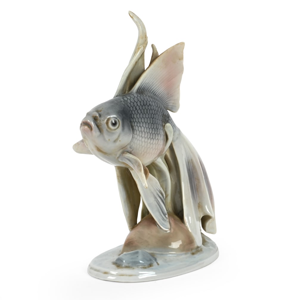 HELMUT DILLER FOR METZLER & ORTLOFF PORCELAIN FISH: Ceramic veil tail goldfish. Marked underneath. Germany, early 20th century. Dimensions: H 6.75" x W 4.5" x D 3.5" Condition: Discoloration, wear consistent with age and use.