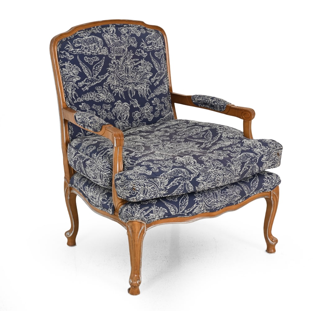 LOUIS XV STYLE FRENCH JACQUARD LOUNGE CHAIR: Carved beech frame and Chinoiserie style jacquard woven upholstery. Dimensions: H 36.5" x W 30.5" x D 27" x SH 21" Condition: Wear consistent with age and use. Minor sun fading, couple of pulled threa