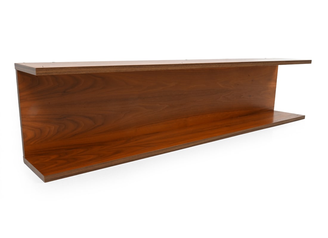 DANISH WALNUT WALL SHELF C. 1970S: Walnut veneer shelf featuring two tiers, mountable to wall from backside. Unmarked. Dimensions: H 10.75" x W 45.5" x D 7.25" Condition: Small losses to veneer, light rubs, wear consistent with age