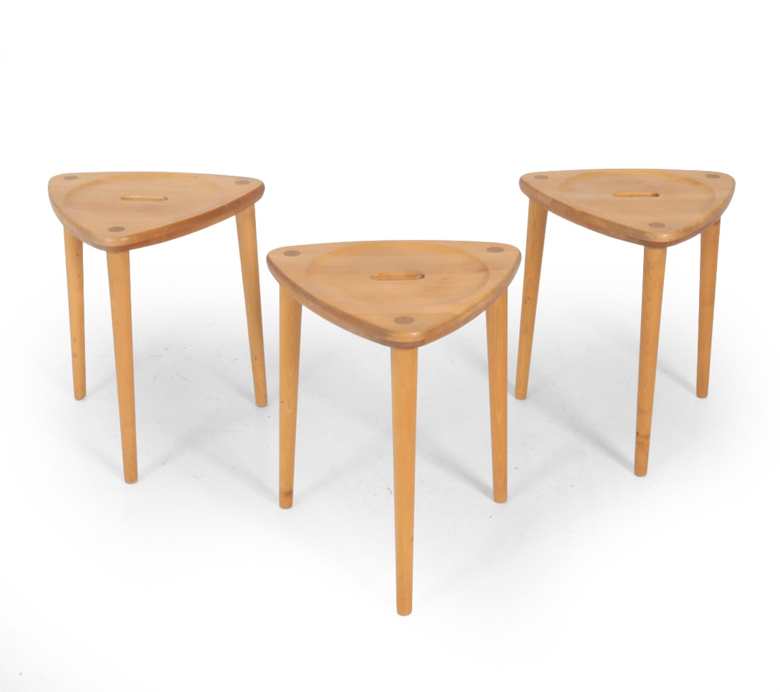MARIT STIGSDOTTER FOR STOLAB SWEDISH BIRCH STOOLS: Stackable "Sgabello" stools made from birch, featuring central cut-out slots. Marked and dated 1999 on underside. Sweden. Dimensions: H 18" x W 14.75" x D 14.75" Condition: Some joint separation to