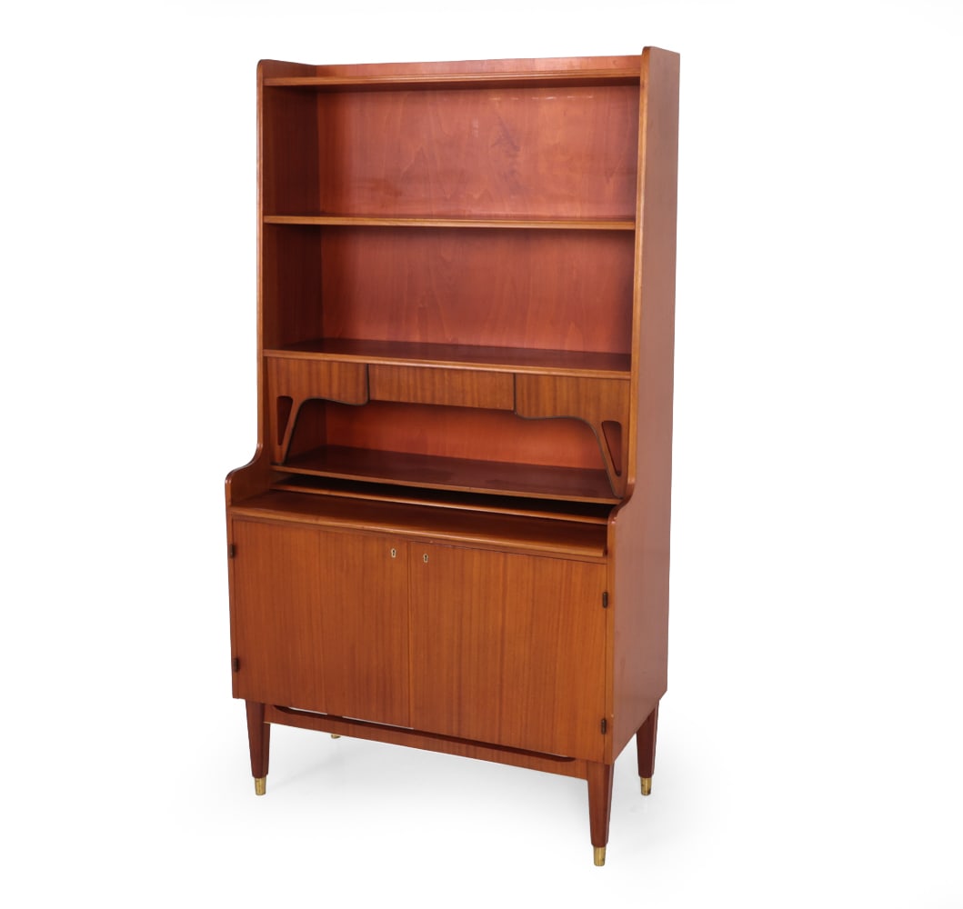 SWEDISH MAHOGANY SECRETARY BOOKCASE C. 1950S: One key included. Brass details. Sweden, circa 1950s. Dimensions: H 69" x W 37.5" x D 17.5" Condition: Scratches, edge losses to veneer, and sun fading. Wear consistent with age and use.