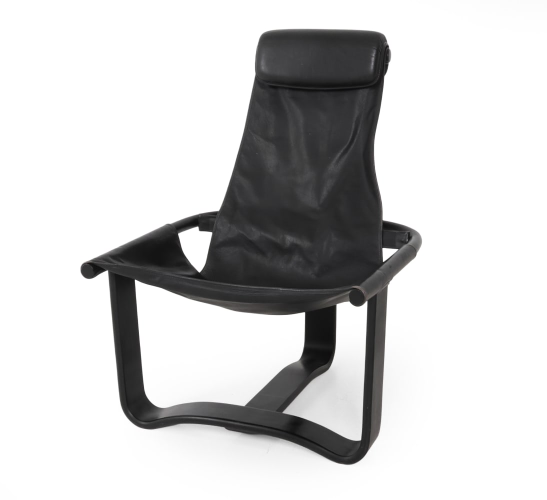 INGMAR RELLING FOR WESTNOFA "MANTA" LOUNGE CHAIR: Black leather sling with tall backrest on a sculptural bentwood frame. Marked "Westnofa furniture". Norway, circa 1970s. Dimensions: H 39" x W 28.5" x D 38", SH 17" Condition: Some wear and rubs to