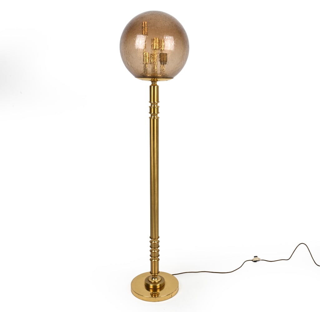 SCANDINAVIAN BRASS & GLASS GLOBE FLOOR LAMP: Slender brass base with a large glass globe atop. Features 7 lights, one socket different. Apparently unsigned. C. 1970s. Dimensions: (Including globe) H 60" x Dia 12" Condition: Chips to rim of