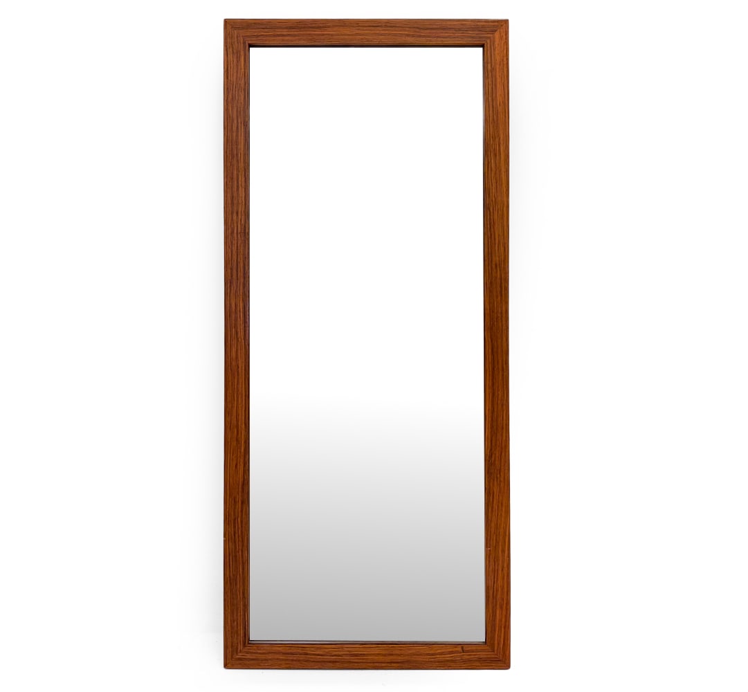 KRON SPEGEL SWEDISH ROSEWOOD MIRROR C. 1960S: Rectangular mirror with rosewood frame. Marked with Kron label. Sweden, circa 1960s. Dimensions: H 43.75" x W 19.25" Condition: Wear consistent with age and use. Minor scuffs, sun fading to frame.