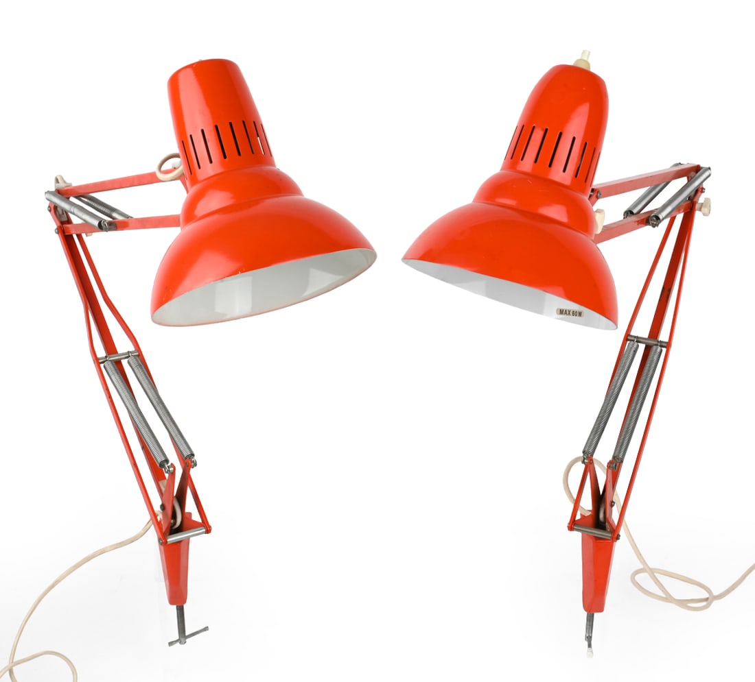PAIR LUXO SWEDISH ADJUSTABLE ARCHITECT LAMPS: Orange articulating lamps. Engraved to arm. Sweden, circa 1970s. Dimensions: H 43" x W 27" x D 22" Condition: Wear consistent with age and use. Untested. European plug. One is missing the top switch.