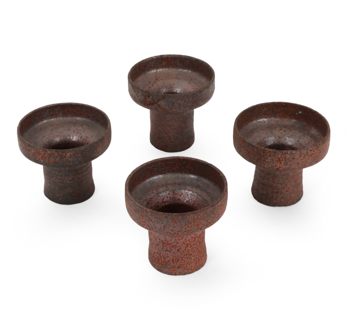 DUTCH CERAMIC CANDLEHOLDERS GROUPING C. 1960S: (4) Candleholders. Dimensions: H 3" x Dia 3.5" Condition: Wear consistent with age and use. One item shows signs of previous repair. Fleabite chips to rims. Some loss to finish.