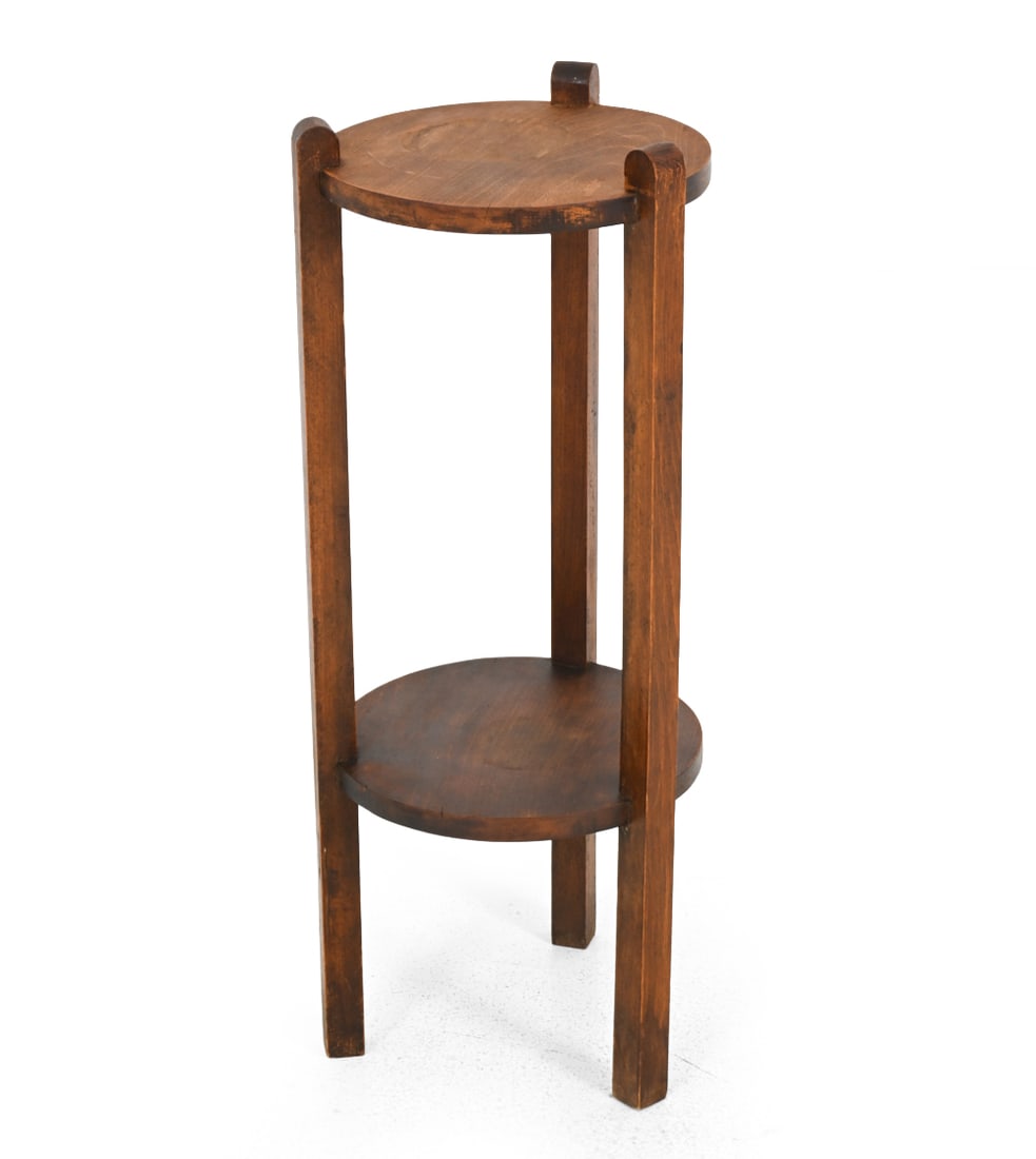 SCANDINAVIAN OAK TWO TIER PLANT STAND C. 1940S: Tall frame fitted with two circular shelves. Scandinavian, circa 1940s. Dimensions: H 29.75" x Dia 12.5" Condition: Water stains, fading and discoloration. Wear consistent with age and use.