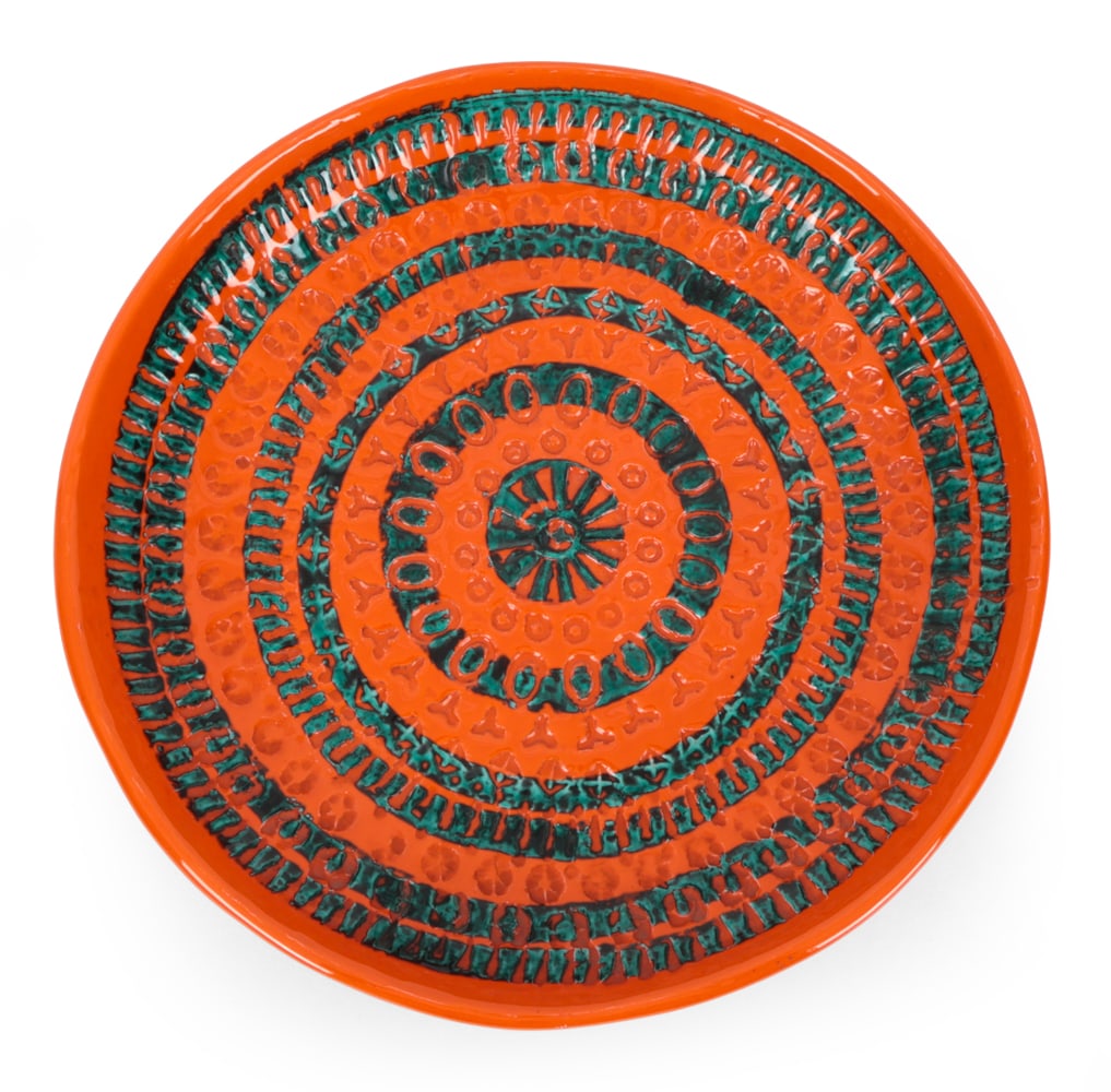 ATTR. ALDO LONDI ITALIAN CERAMIC BOWL: Shallow impressed geometric decoration in orange and turquoise tones. Marked to underside. Italy, circa 1960s. Dimensions: H 2.5" x W 12.5? x D 12.5? Condition: Wear consistent with age and use.