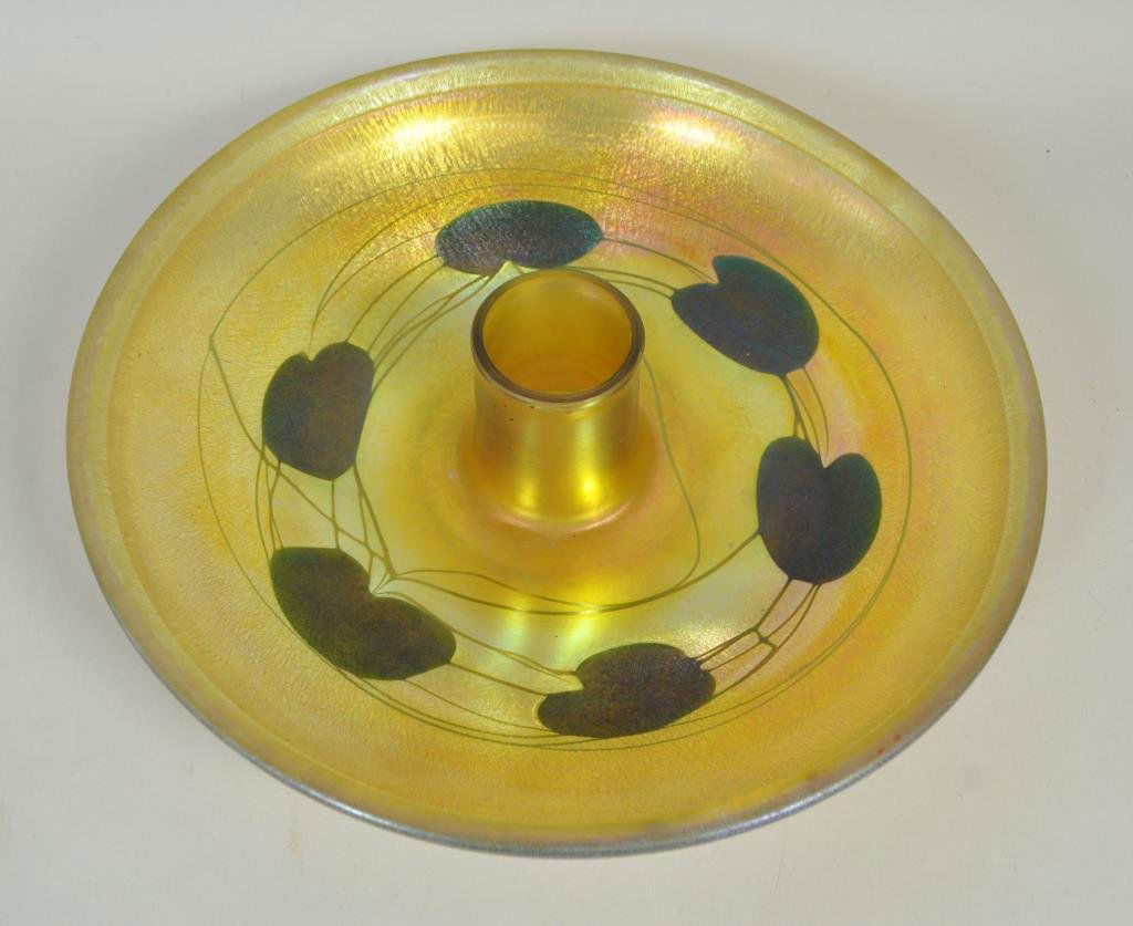 LOUIS C. TIFFANY STUDIOS (AMERICAN 1848 -1933): TIFFANY STUDIOS - Favrille glass " Lily Pads" design center bowl & two- tier flower frog, C.1915 Engraved on bowl: 7034 K, L.C.Tiffany - Favrile Engraved on flower frog: 7034, L.C.Tiffany - Favrile Di