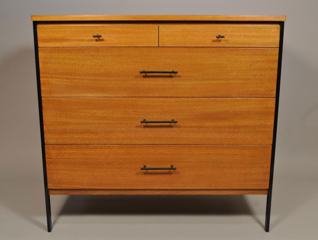 PAUL MCCOBB PLANNER GROUP DRESSER: circa 1950, executed in maple and black enameled steel H 34" x L 36" x W 18" Condition: Light scratching to top and sides due to use.