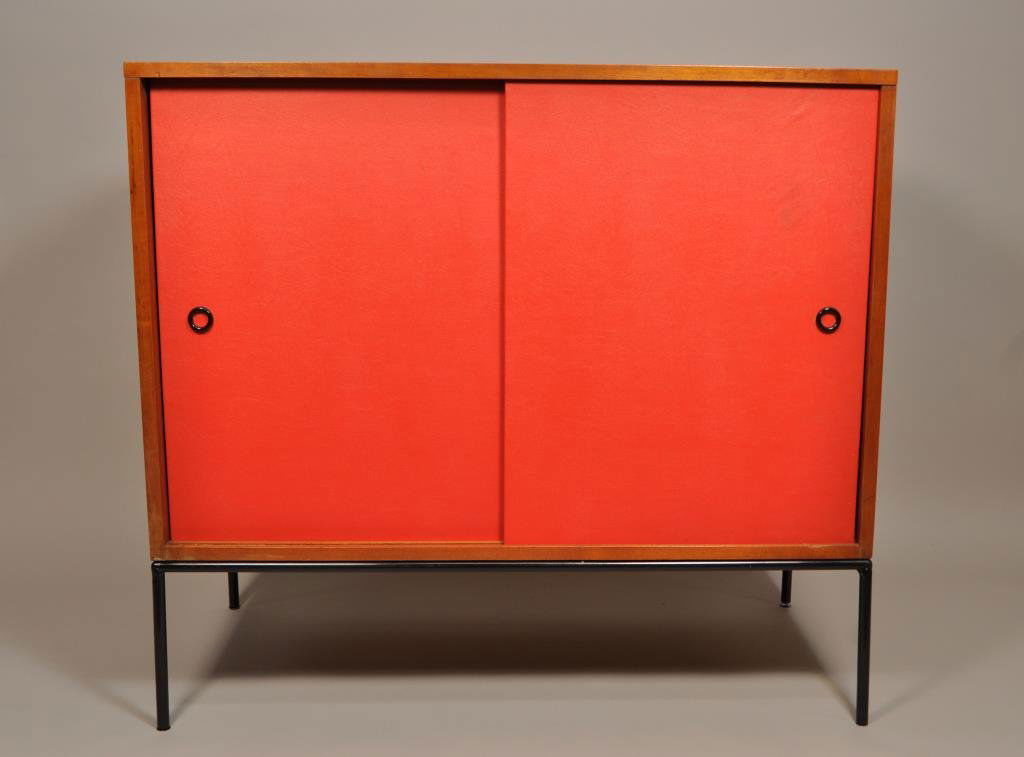 PAUL MCCOBB PLANNER GROUP SLIDING DOOR CABINET: circa 1950, wood and black enameled steel H 33" X L 36" X W 18.25" Condition: Light scratching to top and sides due to use.