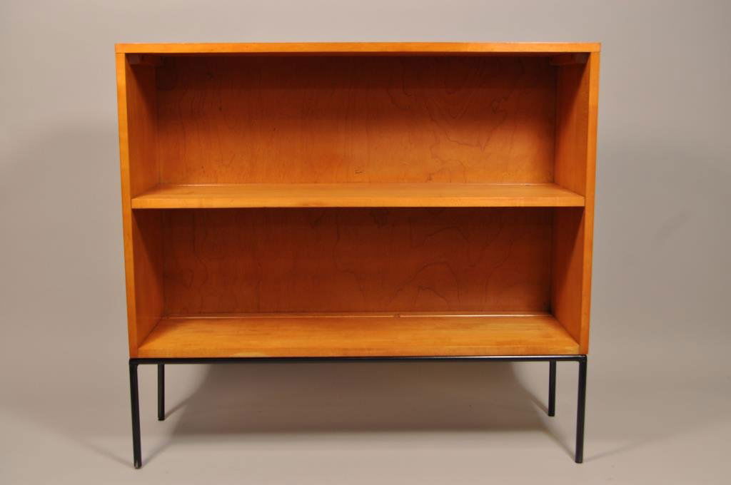 PAUL MCCOBB PLANNER GROUP OPEN BOOKCASE #2: circa 1950, executed in maple and black enameled steel H 33" X L 36" X W 12" Condition: Light scratching to top and sides due to use.
