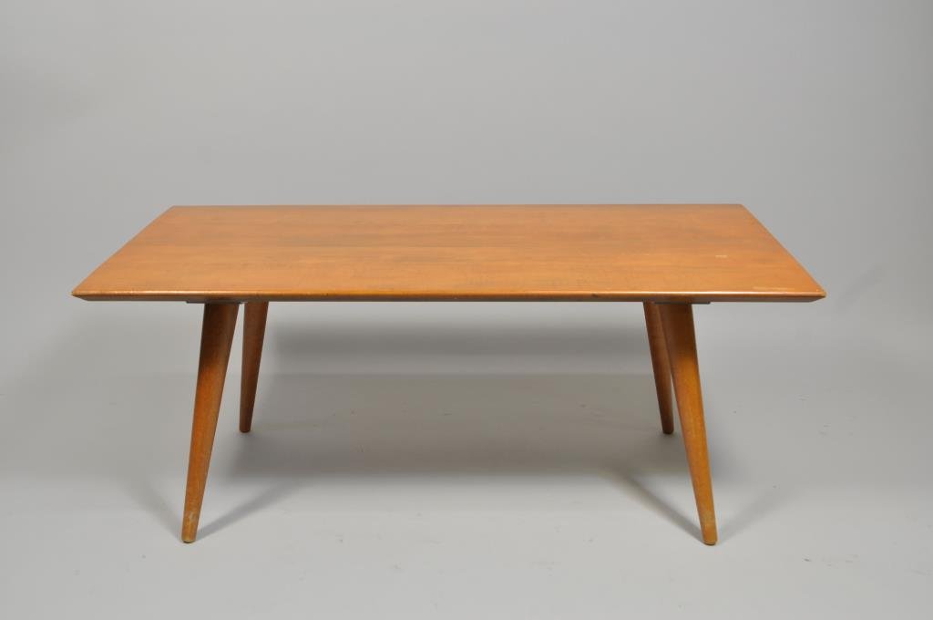PAUL MCCOBB PLANNER GROUP SHORT COFFEE TABLE: H 15" X L 36" X W 18" Condition: Light scratching to top and legs due to use.