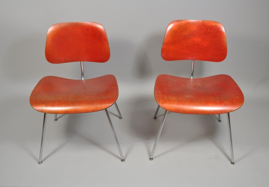 PAIR 1953 CHARLES EAMES ANILINE RED DCM CHAIRS: H 29" X W 21" X W 19.25" Condition: Good. Only slight discoloration, very light pitting.