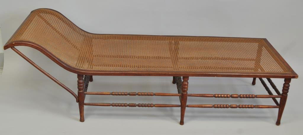 CHAISE LOUNGE WITH WOOVEN SEAT: 24" H at head rest x 16.6" H at foot x 74.5" L x 25" W From a Port Chester, NY Estate.