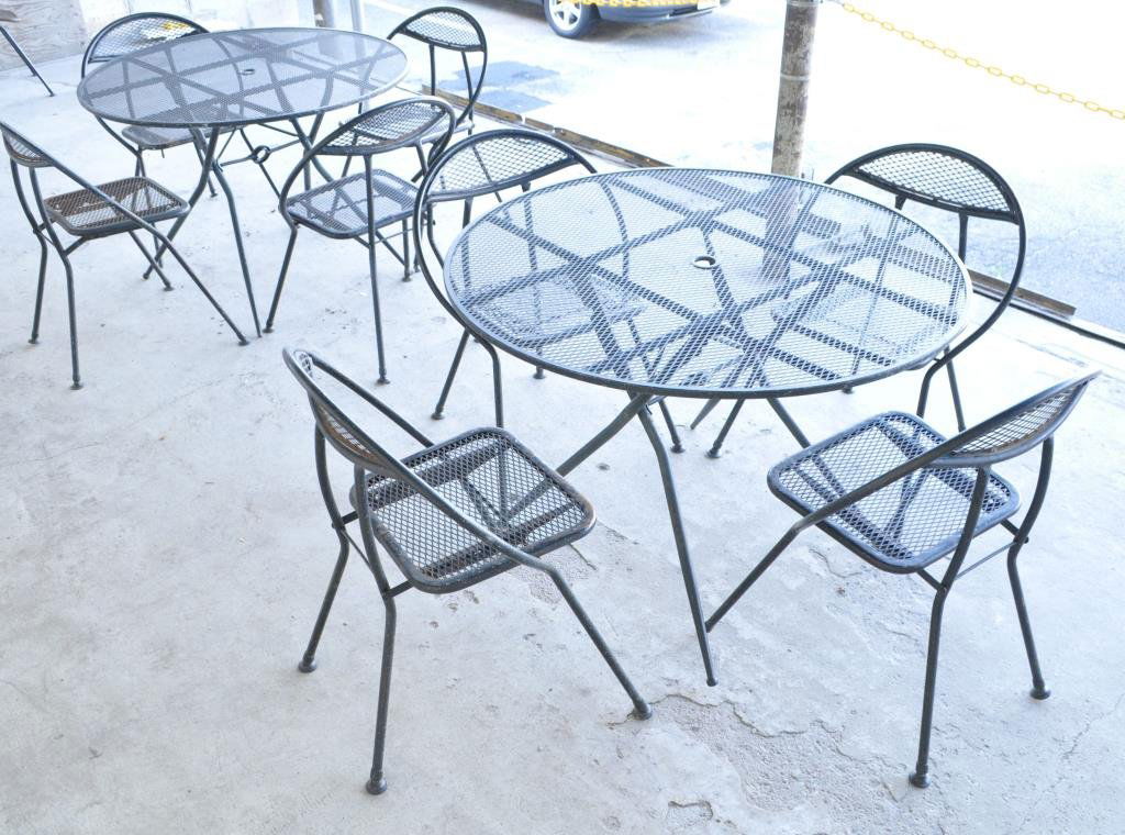 SALTERINI BLACK FOLDING TABLES AND 8 CHAIRS: tables; 28.75" H x 41" diameter chairs: 31" H Provenance: From the Westport, CT Estate of artist Shirley Black