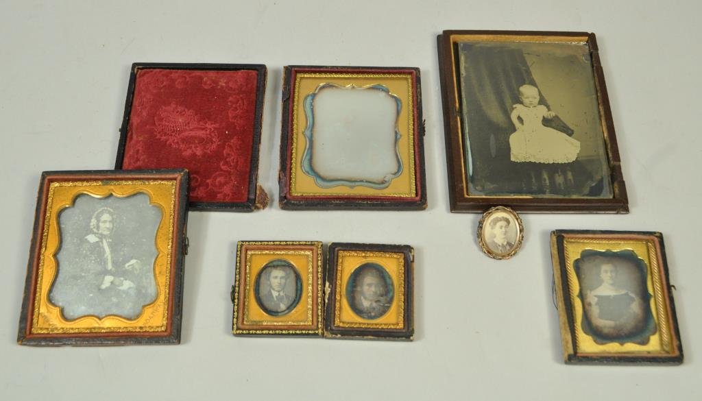 GROUPING OF DAGUERREOTYPES, AMBROTYPE & ALBUMEN: 1. Portrait of a lady this is a nice sixth plate size daguerreotype. Taken by the famous photographer Rufus Anson. The mat is stamped ANSON, BROADWAY and it is in one half leather. Condition: Good, th