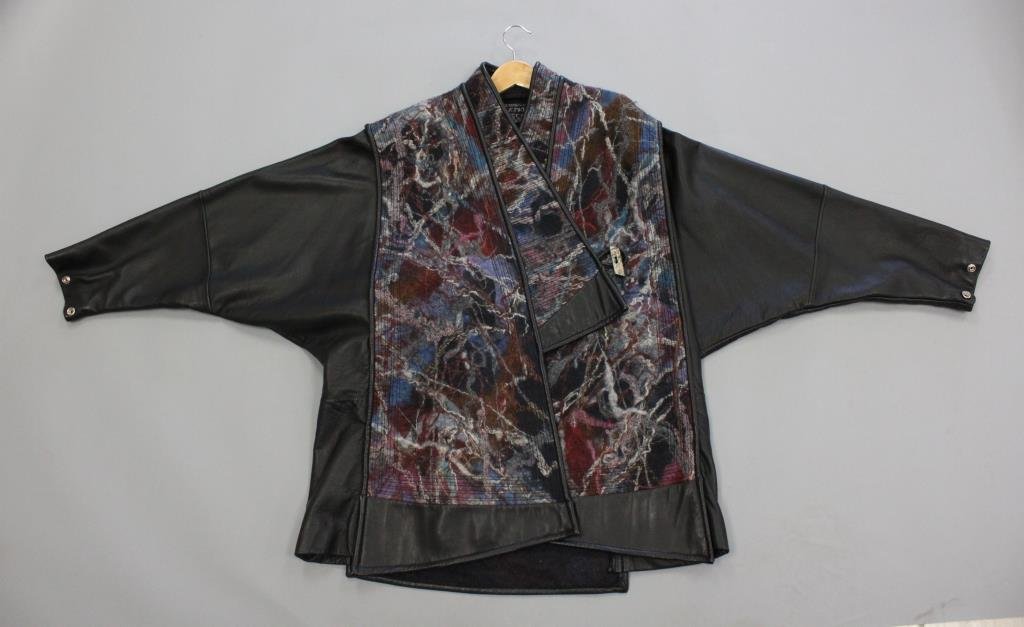 SCYTHIAN IRELAND LEATHER & FELTED WOOL COAT: Genuine leather and felted wool. Tag reads: Scythian Bally Vaughn Ireland. Dolman sleeves. Condition: Good, used. Size: No tag. 33" down back X 32" armpit to armpit X 23" at waist From Port Chester, N