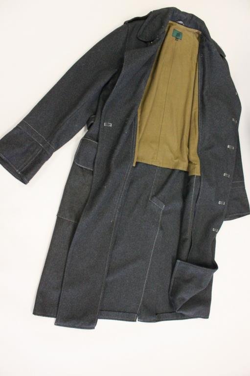 JEAN PAUL GAULTIER JUNIOR CHARCOAL GREY WOOL COAT: Original label. Size: USA 48 Length: 51" Condition: Good, used, missing two buttons. From a Port Chester, NY Estate.