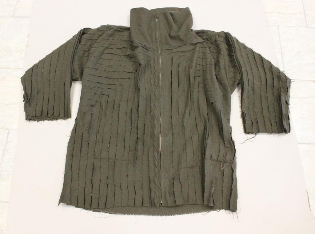 ORIGINAL DESIGNER ARMY GREEN APPLIQUE JACKET: No designer label. Wool, tone on tone applique design. Large inside pockets, zip front. Size: Length: 34" X Width underarm: 27" X Sleeve: 21" Condition: Good, used. No staining or rips. From a Port Ch