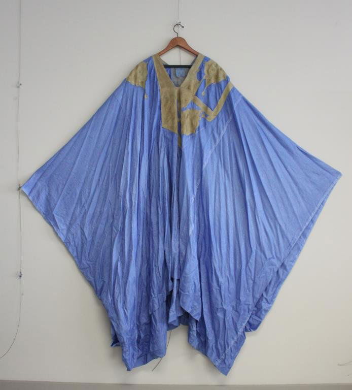 PERIWINKLE BLUE MIDDLE EASTERN CAFTCAN: Vintage, tone on tone blue with ochre hand embroidery. Size: Length: 49" Condition: Good, used. One small stain. The size of a dime. Unlaundered will clean nicely. From a Port Chester, NY Estate.