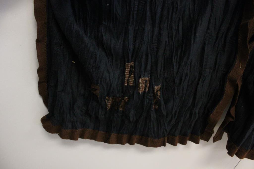 RAY HARRIS LONDON FIBER ART BROWN & BLACK CAPE: Felted wool. With applique brown design. With original label. Size: One Size Condition: Good, used. NO rips, tears or staining. From a Port Chester, NY Estate.
