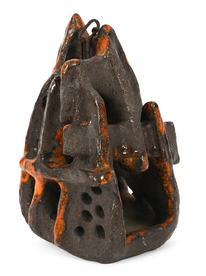 BRUTALIST-STYLE GERMAN CERAMIC SCULPTURE: Ceramic with metal chain at top. Signed and dated 1982 underneath. Signature is indistinct. Germany, 20th century. Dimensions: H 8" x W 5" Condition: Scuffs and scratches. Wear consistent with age. PU