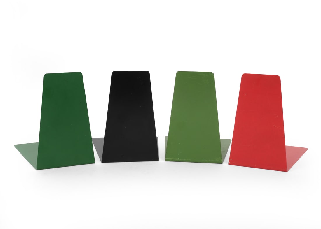 SOENNECKEN GERMAN PAINTED STEEL BOOKENDS 1960S: (4) Marked to surface. Dimensions: H 5.5" x W 5.5" x D 4.75" Condition: Wear consistent with age and use. Minor scuffs.