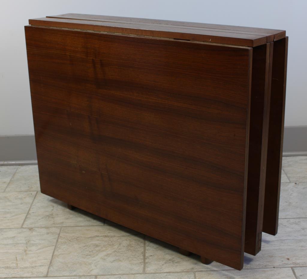 BRUNO MATHSSON STYLE EXTENDING "MARIA" TABLE: Rosewood, with gate legs and drop leafs. Extends to seat 12. Dimensions: Extended H 110" X L 35" X W 28" Condition: very good