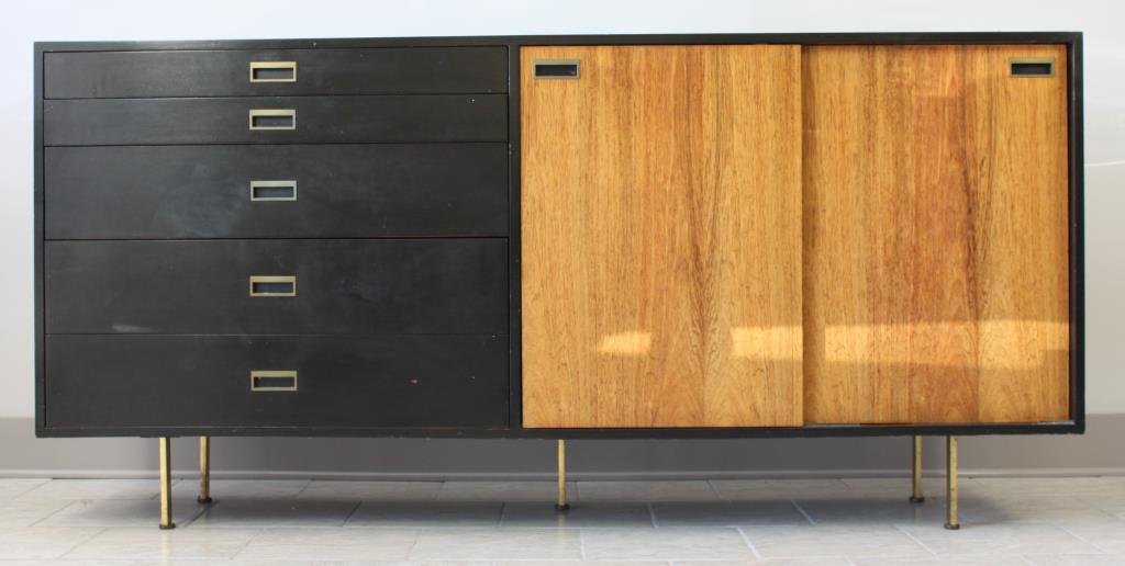 HARVEY PROBBER SIDEBOARD: Beautiful ebonized sideboard, 2 bays with sliding doors and 5 drawers on brass footing. Top drawer fitted for cutlery. Label to inside of top drawer. Dimension: H 37" X L 77.25" X W 18" Condition: sur