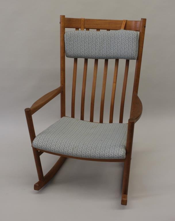 HANS WEGNER ROCKING CHAIR: Teak wood with blue upholstery Manufactured by Tarm Stole c.1965 Dimension: H 43" X L 27" X W 30" Condition: excellent
