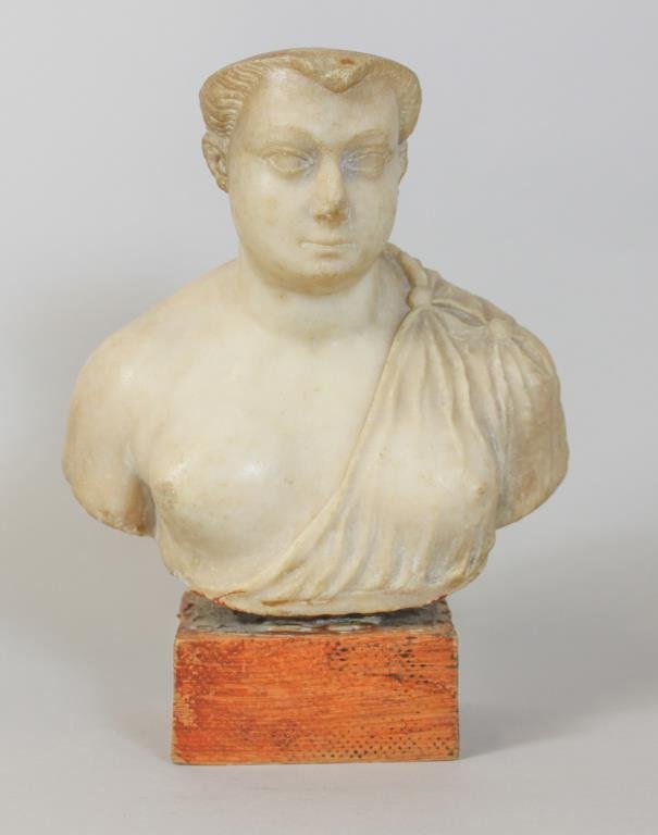 ROMAN FEMALE BUST: Carved white marble. Dimension: H 8" x W 7 1/2" x D 4 1/2" wood base: H1 5/8" x W 4" x D3 1/2' Condition: old chips, scuff marks & hole on top of head.